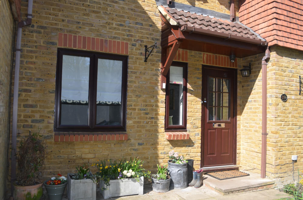 uPVC slimline windows and entrance door in Rosewood