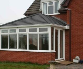 White upvc conservatory with guardian roof