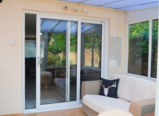 sliding upvc door in white