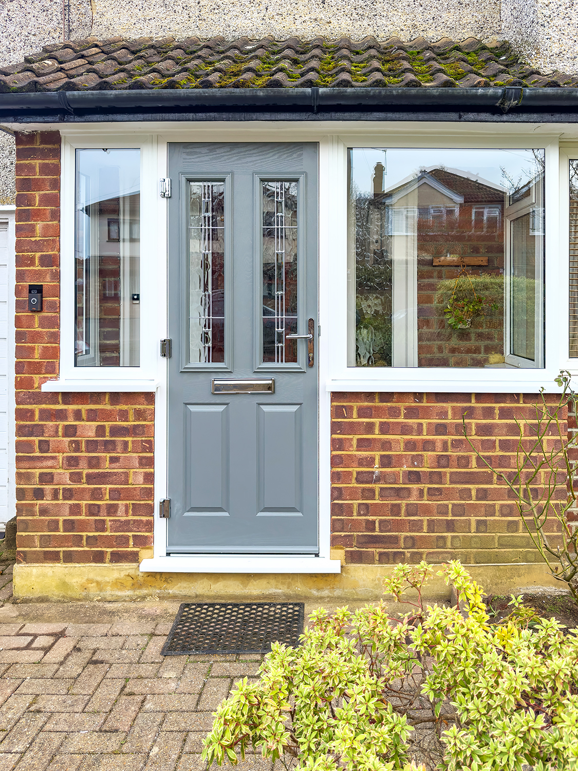 Mouse Grey composite front door and porch side windows